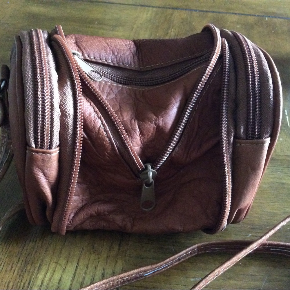 Expandable Soft Leather Pouch.